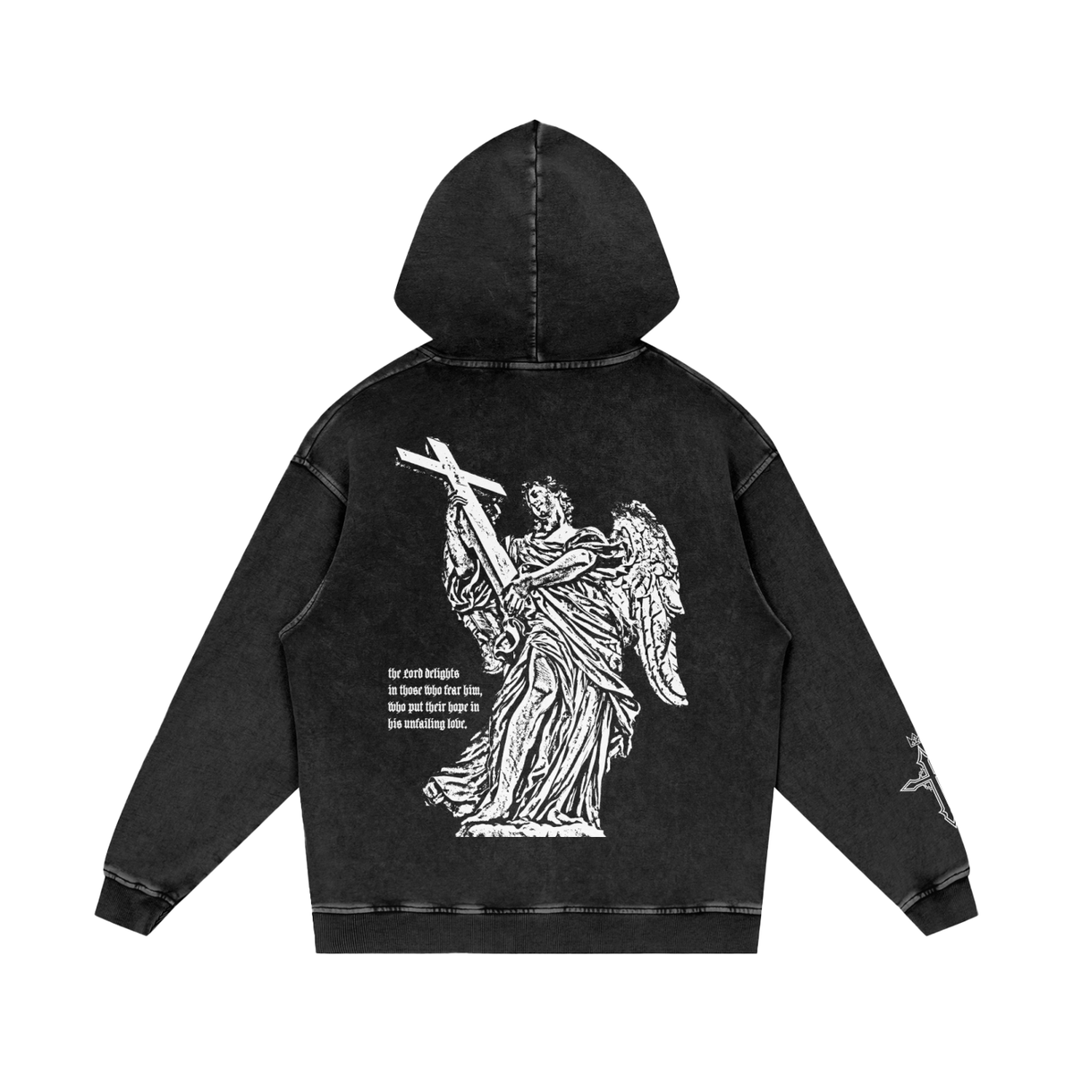 A black mineral-wash hooded sweatshirt shown from the back, featuring a large white graphic of an angel carrying a cross with text that says " the Lord delights in those who fear him, who put their hope in his unfailing love." plus a small white cross on the right sleeve.